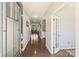 Inviting foyer with hardwood floors and neutral paint, leading to living areas at 11206 Grenfell Ave, Huntersville, NC 28078
