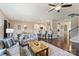 Inviting living room flows into a modern kitchen, complete with a breakfast bar and contemporary finishes at 11206 Grenfell Ave, Huntersville, NC 28078