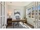 Cozy home office with ample natural light, a desk, and a view of the neighborhood at 11206 Grenfell Ave, Huntersville, NC 28078