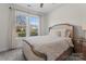 Bright bedroom with neutral carpet and a large window offering view of the yard at 12018 Grey Partridge Dr, Charlotte, NC 28278