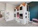 bedroom with custom built-in bunk beds that look like a playhouse with windows and drawers at 12018 Grey Partridge Dr, Charlotte, NC 28278