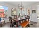 Bright dining room featuring a stylish light fixture and an eye-catching rustic wood bench at 12018 Grey Partridge Dr, Charlotte, NC 28278