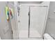Sleek bathroom featuring glass-enclosed shower with chrome hardware and neutral finishes at 1244 Madison Towns Ln, Charlotte, NC 28209