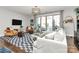 Comfortable living room with a stylish rug, modern furniture, and ample natural light at 1244 Madison Towns Ln, Charlotte, NC 28209