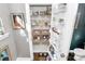 Well-organized pantry with wire shelves, storage containers, and ample space at 1244 Madison Towns Ln, Charlotte, NC 28209