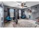 A bedroom with sports themes, including wall decor and exercise equipment creates an active space at 13132 Purple Dawn Dr, Charlotte, NC 28213