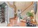 Inviting foyer featuring a staircase, hardwood floors, and a high ceiling at 13132 Purple Dawn Dr, Charlotte, NC 28213