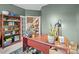 Home office featuring a large desk, ample storage, and natural light at 13132 Purple Dawn Dr, Charlotte, NC 28213