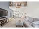 Spacious living room featuring a loft, neutral carpet, and a comfortable sofa at 157 Talbert Town Loop, Mooresville, NC 28117