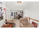 This loft features neutral walls and is furnished with comfortable seating and storage at 157 Talbert Town Loop, Mooresville, NC 28117
