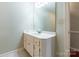 Well-lit bathroom with a single vanity featuring a white countertop and cabinet at 1910 Connemara Ct, Gastonia, NC 28054
