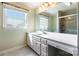 Bright bathroom featuring a large vanity with white countertop, big mirror, and shower at 1910 Connemara Ct, Gastonia, NC 28054