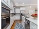 Modern kitchen with stainless steel appliances, granite counters, and a stylish backsplash at 2209 Lincolnshire Ln, Waxhaw, NC 28173