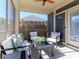 Relaxing screened porch with comfortable seating, ceiling fan, and views of the outdoors at 2209 Lincolnshire Ln, Waxhaw, NC 28173