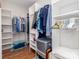 Spacious walk-in closet featuring custom shelving for ample storage space and organization at 2209 Lincolnshire Ln, Waxhaw, NC 28173