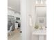 Bathroom featuring a pedestal sink, decorative mirror, and white walls at 222 Ventner Ct, Charlotte, NC 28214