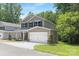 Beautiful two-story home with a two-car garage and manicured landscaping at 222 Ventner Ct, Charlotte, NC 28214