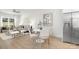 Open-concept living space with a dining area and modern decor featuring lots of natural light at 222 Ventner Ct, Charlotte, NC 28214