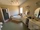 Luxurious bathroom with a soaking tub, glass-enclosed shower, and double vanities at 228 Hazeleen Ave, Belmont, NC 28012