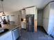 Well-equipped kitchen featuring stainless steel appliances, ample cabinet space, and an eat-in island at 228 Hazeleen Ave, Belmont, NC 28012