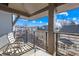 Cozy balcony with seating, offering an inviting outdoor space with neighborhood views at 2401 Euclid Ave # 306, Charlotte, NC 28203