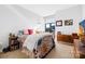 Bright bedroom with eclectic furnishings and a cozy atmosphere, accentuated by natural light from the window at 2401 Euclid Ave # 306, Charlotte, NC 28203