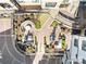 An aerial view shows a nicely landscaped courtyard with patio furniture and green landscaping at 2401 Euclid Ave # 306, Charlotte, NC 28203