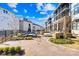 A nicely landscaped courtyard features a lounge area with green plants at 2401 Euclid Ave # 306, Charlotte, NC 28203