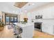 Beautiful kitchen boasts a large island with quartz countertops, stainless steel appliances, and modern pendant lighting at 2401 Euclid Ave # 306, Charlotte, NC 28203
