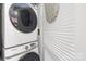 Convenient laundry room equipped with a modern washer and dryer set, maximizing efficiency and space at 2401 Euclid Ave # 306, Charlotte, NC 28203