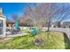 Inviting backyard with patio set, fire pit, and lush lawn, creating an ideal space for outdoor gatherings and leisurely enjoyment at 249 Sand Paver Way, Fort Mill, SC 29708