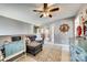 Inviting bonus room with a comfortable sectional, unique decor, and stylish rug at 249 Sand Paver Way, Fort Mill, SC 29708