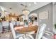 Bright dining room features a beaded chandelier, an arched entry and seating for four at 249 Sand Paver Way, Fort Mill, SC 29708