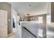 Bright hallway with open space, staircase, and doorway leading to other rooms at 249 Sand Paver Way, Fort Mill, SC 29708