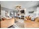 Bright living room showcases a fireplace, floating shelves, and modern decor at 249 Sand Paver Way, Fort Mill, SC 29708
