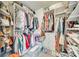 Large walk-in closet with custom shelving, hanging rods, and ample storage space at 249 Sand Paver Way, Fort Mill, SC 29708