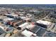 An aerial view features a commercial building with surrounding establishments, parking lots, and the urban landscape at 300 S Main St # K, Salisbury, NC 28144