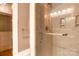 Marble tiled shower with grab bar and overhead lighting at 300 S Main St # K, Salisbury, NC 28144
