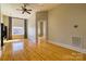 Open living area featuring hardwood floors and neutral paint at 300 S Main St # K, Salisbury, NC 28144