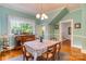 Elegant dining room with classic decor, hardwood floors, and natural light at 306 W Marsh St, Salisbury, NC 28144