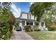 Charming white two-story home with a covered driveway and well-maintained landscaping at 306 W Marsh St, Salisbury, NC 28144