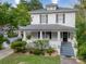 Charming two-story home with a welcoming front porch and well-maintained landscaping at 306 W Marsh St, Salisbury, NC 28144