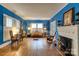 Inviting living room with hardwood floors, fireplace, and a view of natural light at 306 W Marsh St, Salisbury, NC 28144