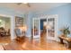 Light-filled living room with hardwood floors, French doors, and inviting decor at 306 W Marsh St, Salisbury, NC 28144