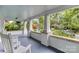 Inviting front porch featuring white rocking chairs with a view of the neighborhood at 306 W Marsh St, Salisbury, NC 28144
