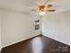 Large main bedroom with wood-look floors and a large window for lots of light at 313 Pelling Dr, York, SC 29745