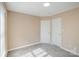 Bedroom featuring neutral paint, plush carpet, a window offering natural light, and a closet for storage at 3230 Richway Ct, Charlotte, NC 28216