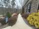 Well-manicured landscape and walkway leading to the Gibson home at 404 Imperial Way, Albemarle, NC 28001