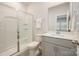 Clean bathroom features a glass-enclosed shower and a vanity with modern fixtures at 4548 Millennium Ave, Charlotte, NC 28217