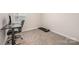 Bedroom features a desk and a chair, plus a treadmill for exercise at 4548 Millennium Ave, Charlotte, NC 28217